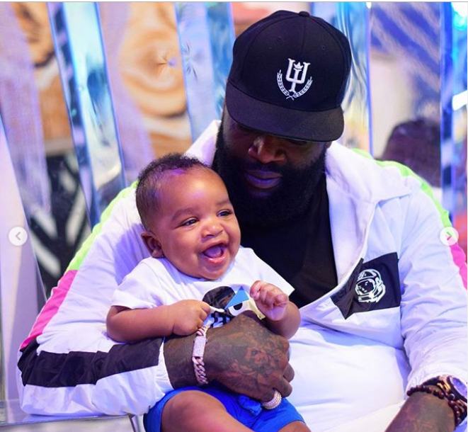 Rick Ross with his kid