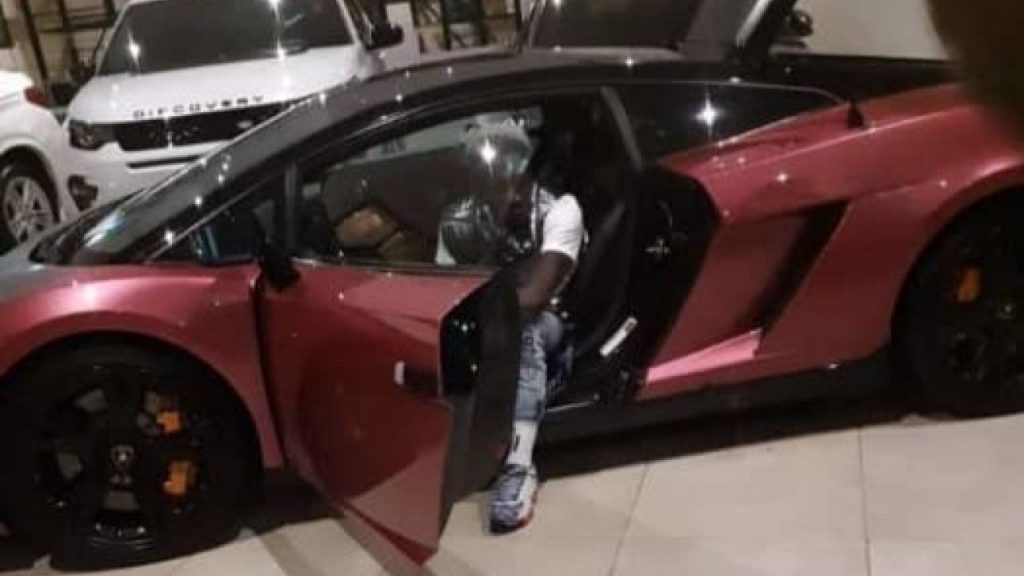 Shatta Wale in his brand new Lamborghini car