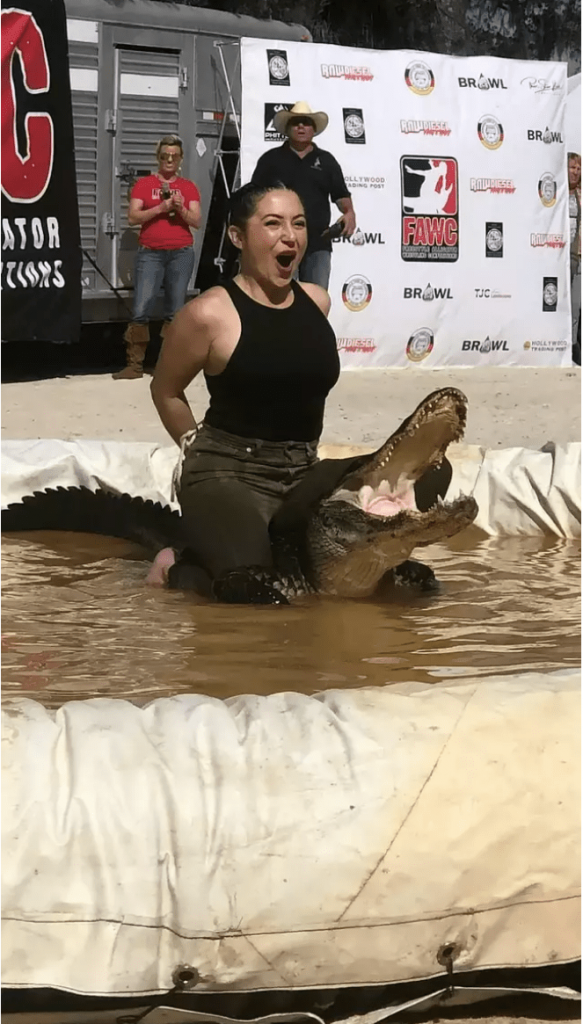 lady stuck head in crocodile