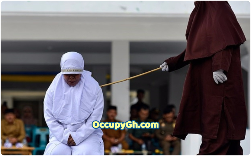 Muslim Woman caned public for having sex