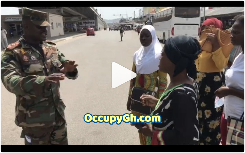Young Lady Challenges Military Officer Amidst Lockdown