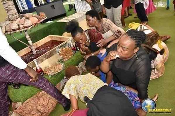 pastor church members eat millipedes beer