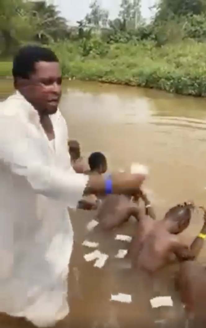 Prophet  spraying money boys river