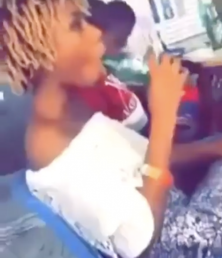 Lady sucking coke bottle