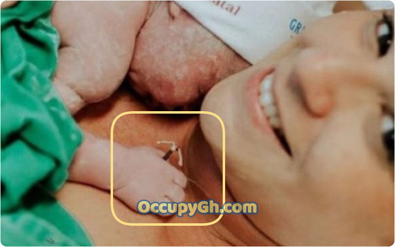 Newborn Baby Holding Mum Contraception Coil