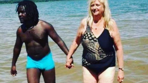 black man with aged white woman