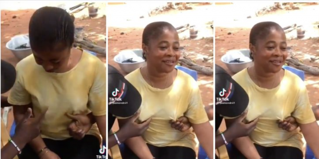 ghanaian lady allows boy handle chest