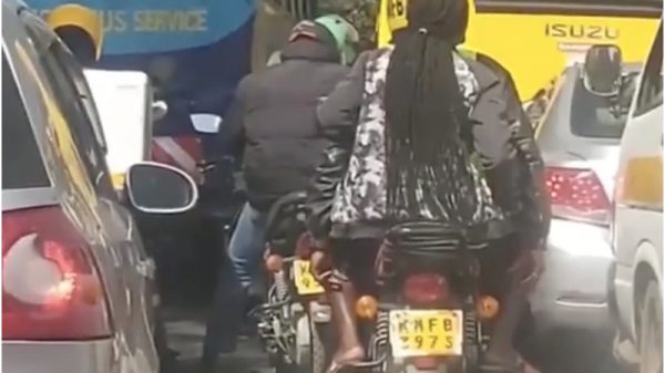 motorbike rider on camera female passenger
