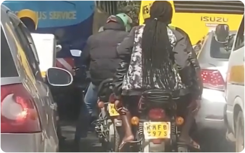 motorbike rider on camera female passenger