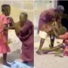 two elderly women fight