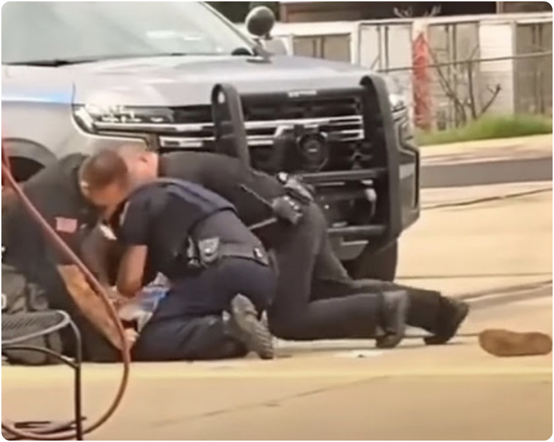 Arkansas police beating homeless man
