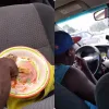 taxi driver eats kenkey driving