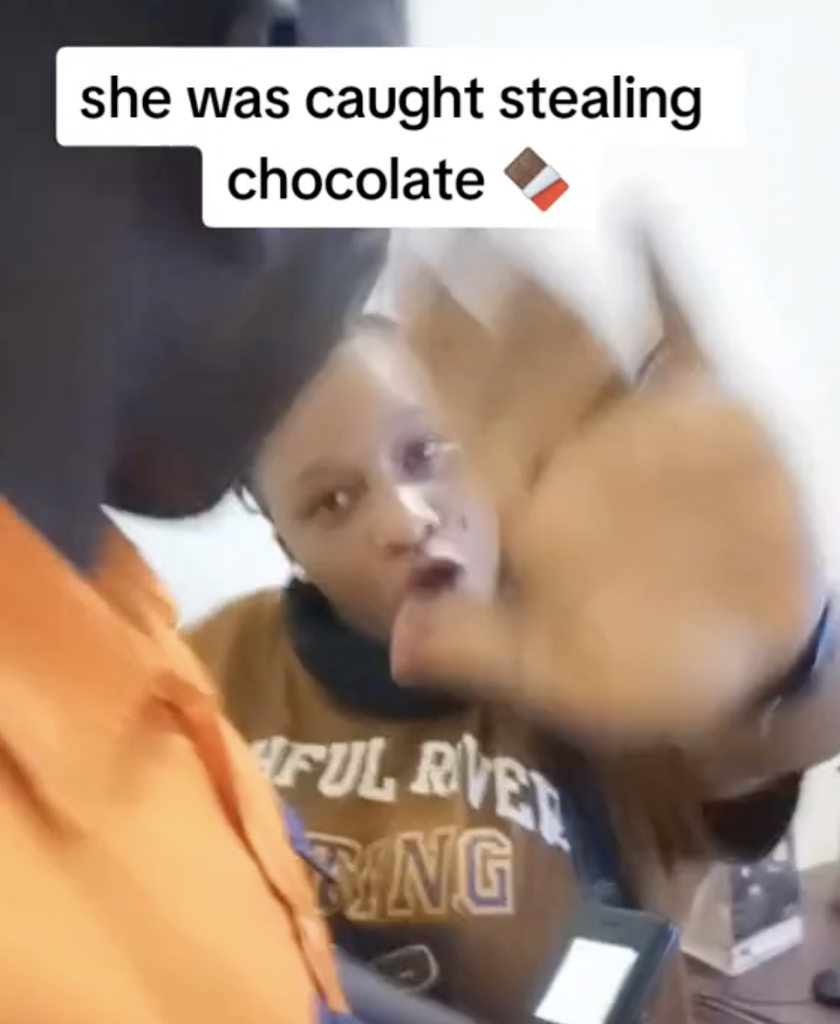 Woman Stealing chocolate