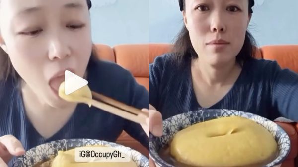 chinese lady eating fufu